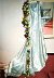 TUMULTUEUSE, Home-gown of hand painted silk Jacquard motif, dating from the 1930`s. Ornate with a garland of silk flower
